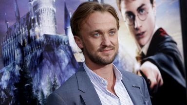Actor Tom Felton poses for a special preview opening of 